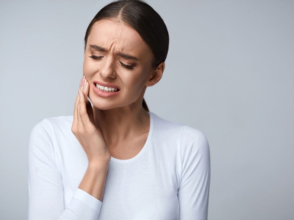 Woman experiencing toothache