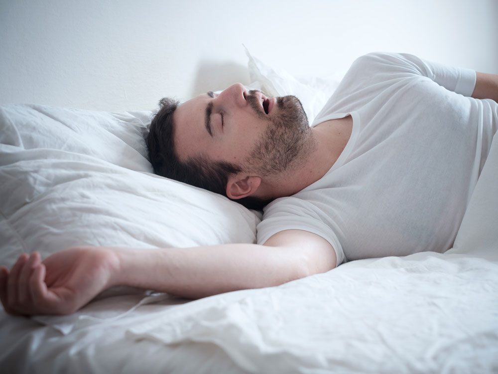 Man suffering from sleep apnea
