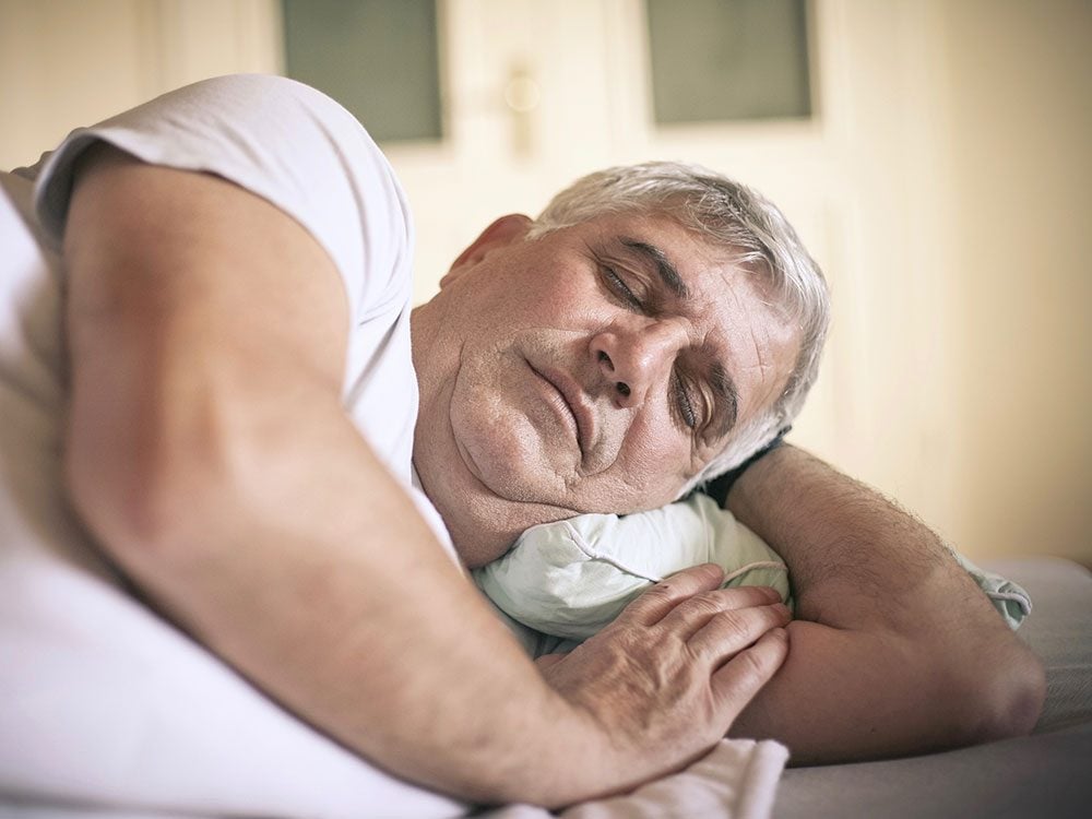 Senior man sleeping in daytime