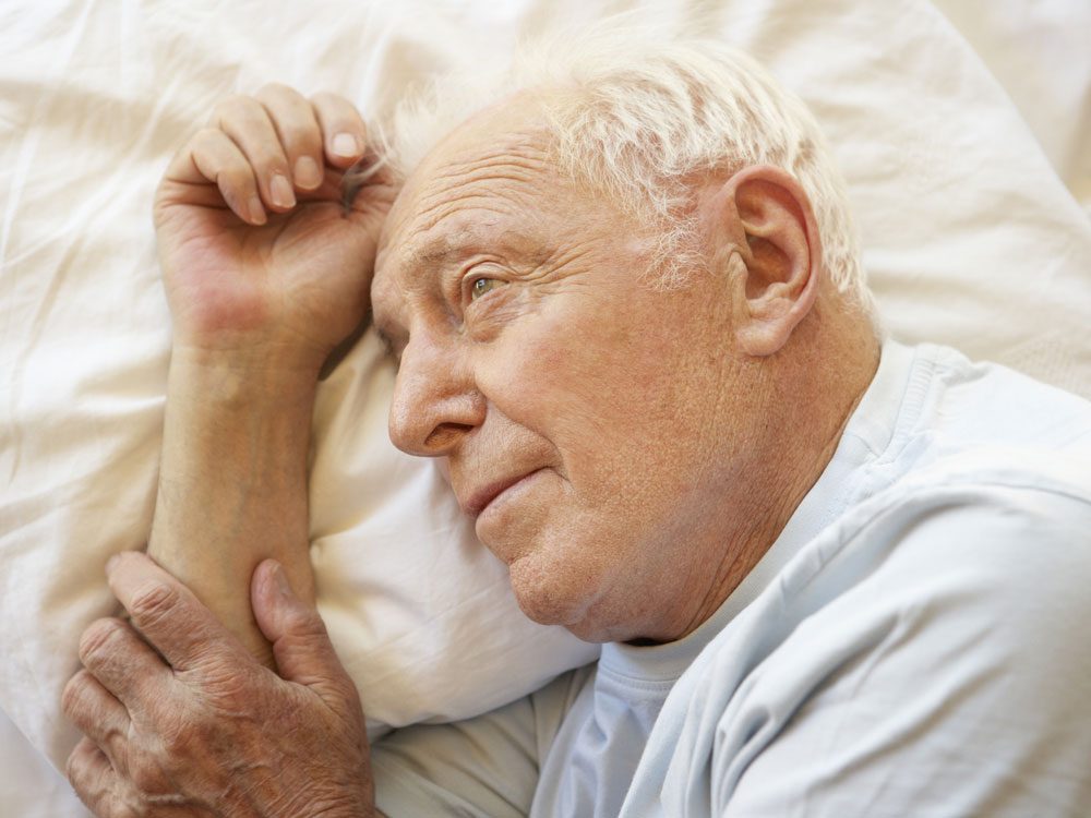 Senior man experiencing sleep deprivation