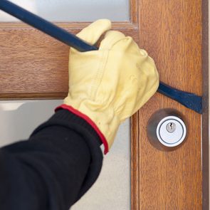 Ways burglars break into homes - burglar with crowbar
