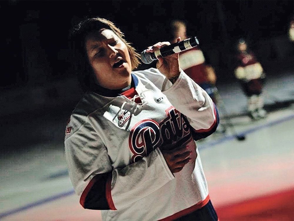 Teagan Littlechief performing at CFL game