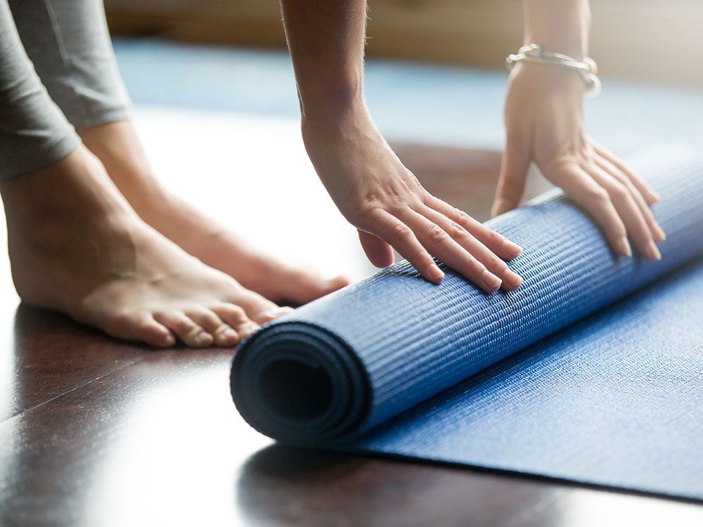 Rolling up yoga mat