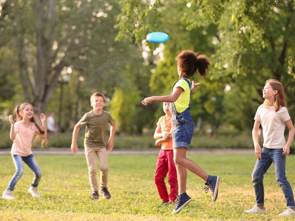 Group of children playing with frisbee