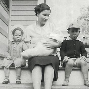 June as a baby in her mother Dorothy’s arms, with her sister Noreen and brother Wallace