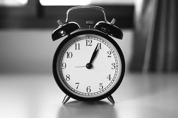 A classic clock in black & white tone with blur background