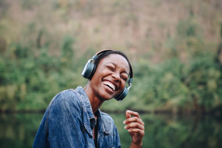 Smiling woman wearing headphones