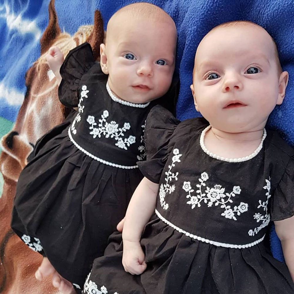 Twin baby sisters