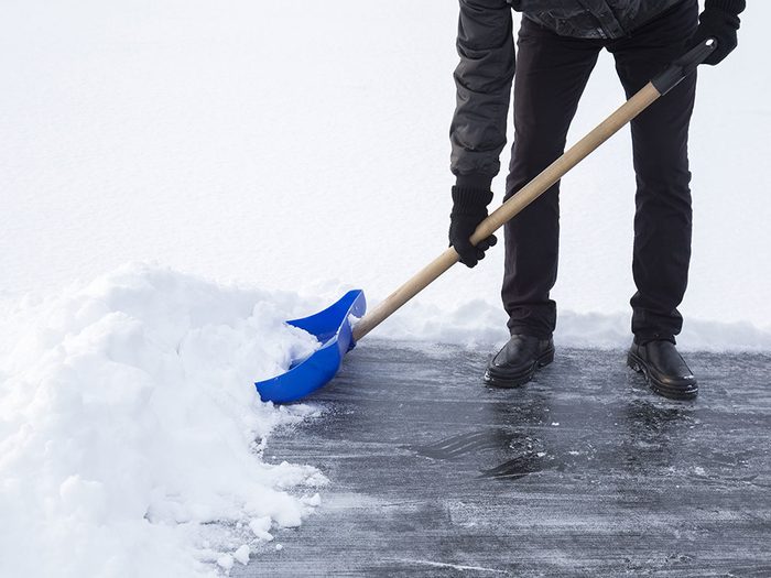Use cooking spray on a snow shovel
