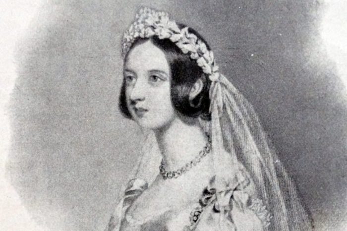 Queen Victoria of the United Kingdom in her bridal dress and veil before her wedding to Prince Albert, 1840.