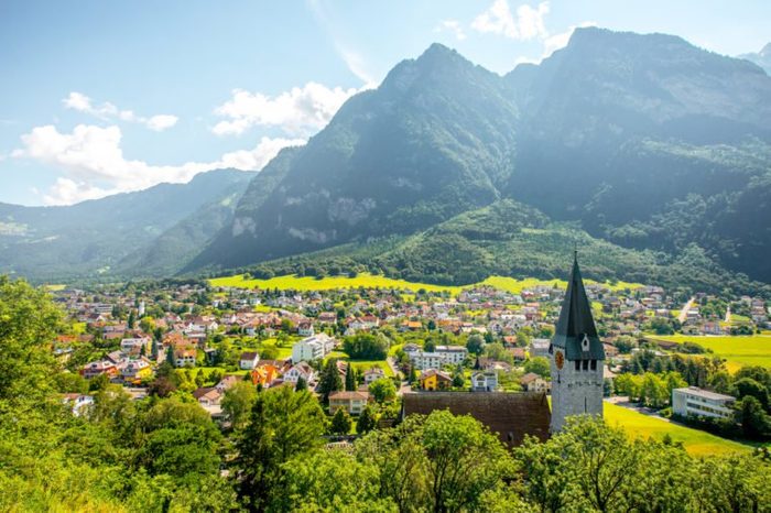 Landscape view on Balzers village with saint Nicholas church in Liechtenstein