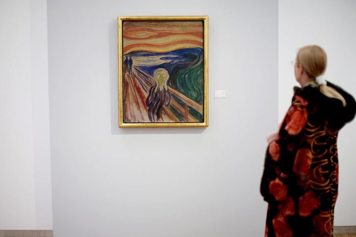 A Visitor Eyes Edvard Munch's Painting 'The Scream' on Display at the Exhibiton 'Scream and Madonna - Revisited' at the Munch Museum in Oslo Norway 23 May 2088 Munch's Works of Art 'The Scream' and 'Madonna' Were Returned to the Munch Museum After Their Theft From the Museum in August 2004 the Paintings Have Been Restored and Conserved and Are Now Back on Display in the Exhibition That Runs Until 26 September 2008 Norway Oslo