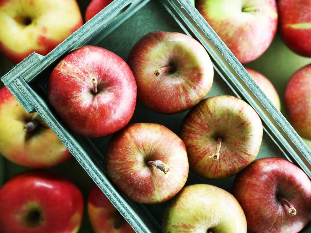 Red apples in a crate