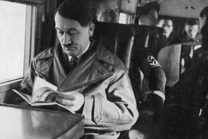 Adolf Hitler Reading On an Aeroplane Circa 1935
