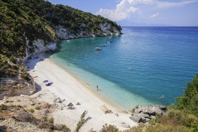 Holiday makers on the beach of Zakynthos, Greece - 25 Jul 2015