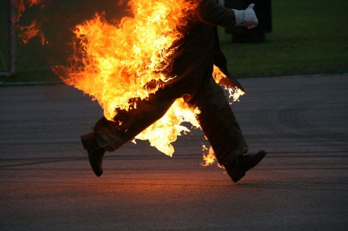 running stunt man on fire
