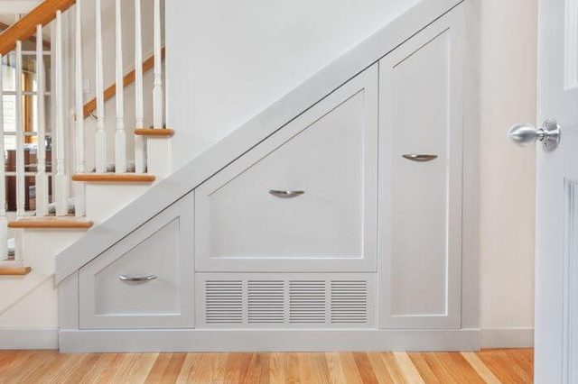 Gliding under stair pullout cabinets for kitchen small appliance storage