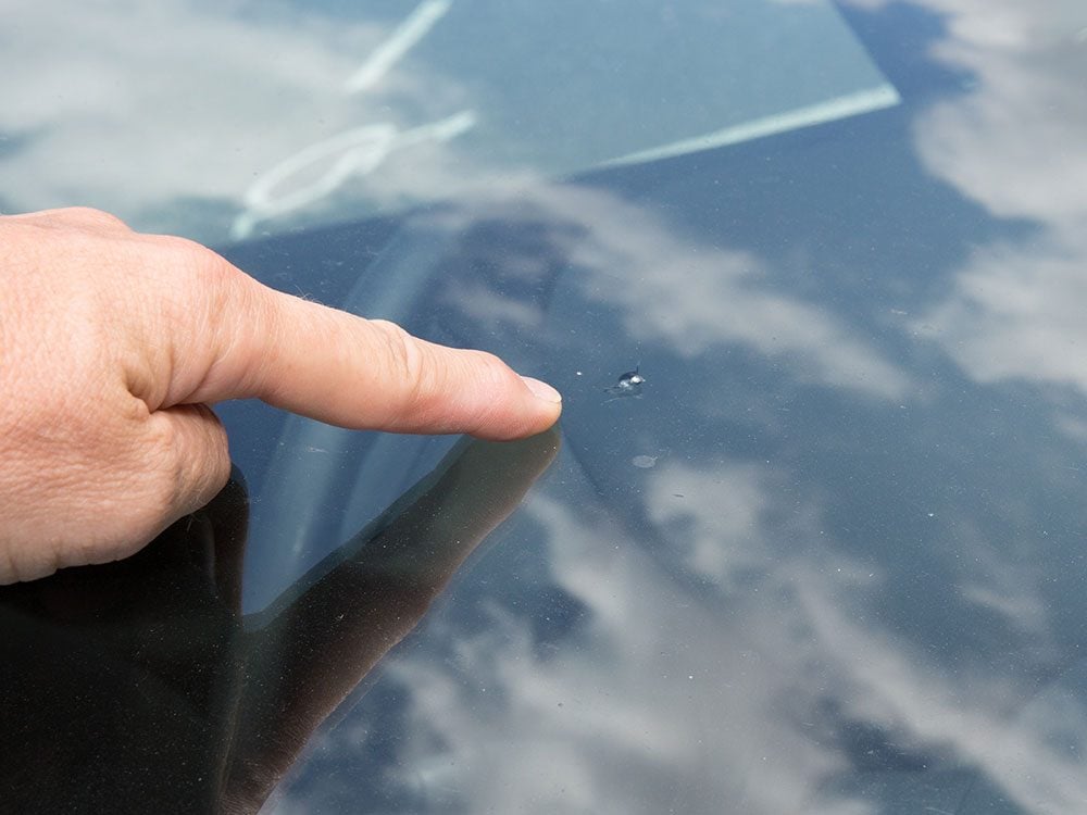 Use nail polish to stop a windshield chip from spreading