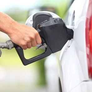 How to improve gas mileage - filling car with gas