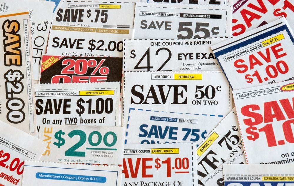 Colorful clipped multi valued grocery coupons. Supermarket shopping.