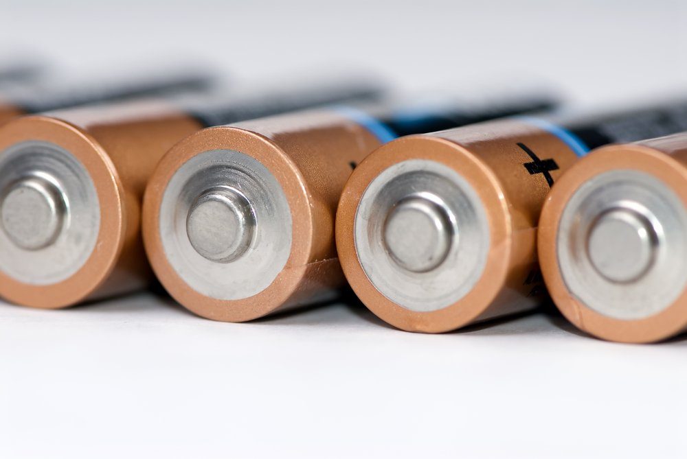 AA batteries lined up in a roll...close up