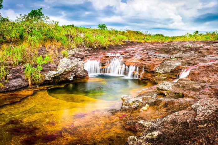 Multicolored waterfall river in Colombia, Cano Cristales