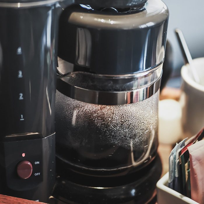 Making drip black coffee by Coffee Maker Machine
