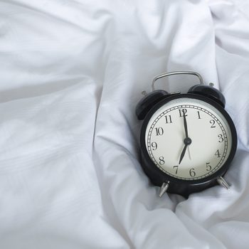 worst time of day to have sex - clock on bed