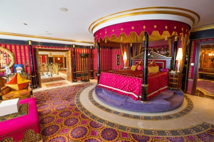 Dubai, UAE - FEBRUARY 18, 2018: Burj Al Arab royal suite. Interior of Burj Al Arab famous Dubai hotel. 7 star luxury hotel. Dubai symbol. Iconic the most luxurious hotel in the world. Luxury bedroom.