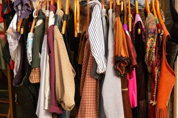 Rack of Vintage Old West Clothing, vests, dresses, shirts
