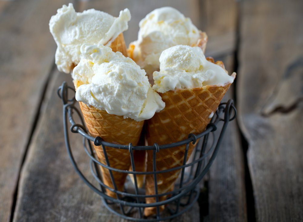 vanilla ice cream on wooden surface