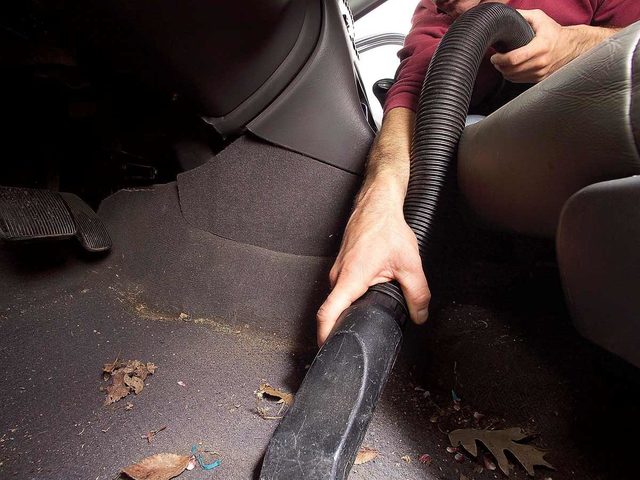 Vacuuming inside of car