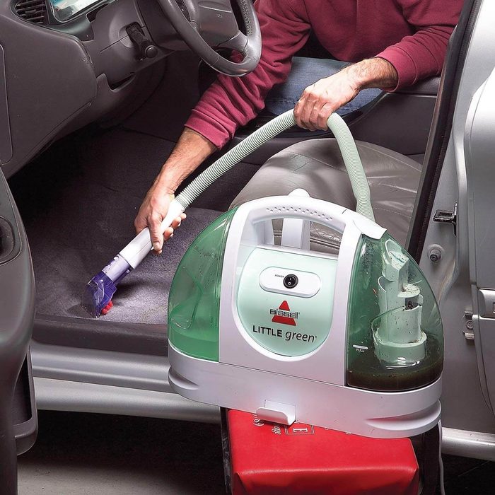 Cleaning carpet of car