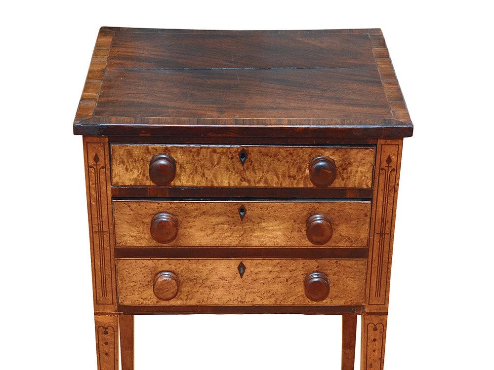 Two-drawer Sheraton stand belonging to an antique collector