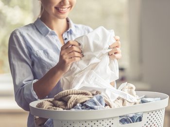 Whiten without bleach - woman doing laundry