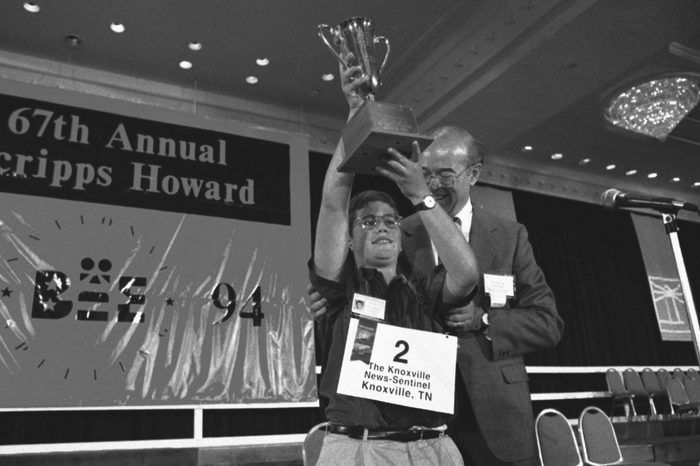 Ned G. Andrews, William Burleigh Ned G. Andrews, 13, a seventh-grader from Knoxville, Tenn., is congratulated by William Burleigh, chief operating officer of Scripps Howard Inc., after winning the National Spelling Bee in Washington, D.C
