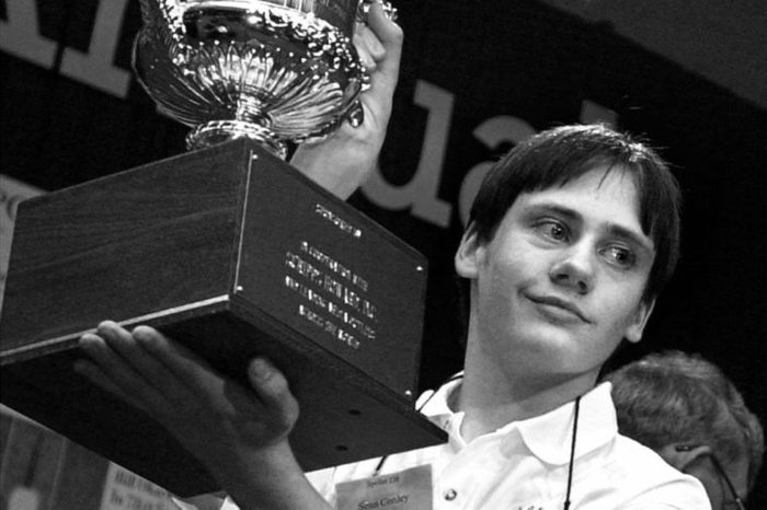 CONLEY Sean Conley, 13, of Shakopee, Minn., holds a trophy after winning the 74th annual National Spelling Bee in Washington