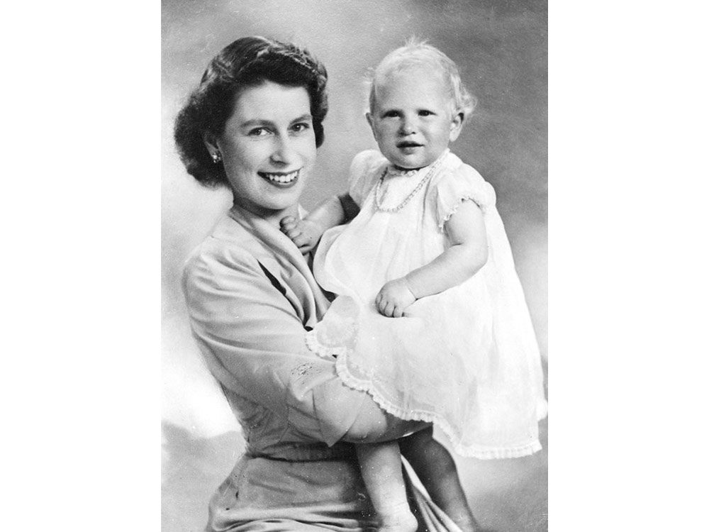 Queen Elizabeth with a baby Prince Charles