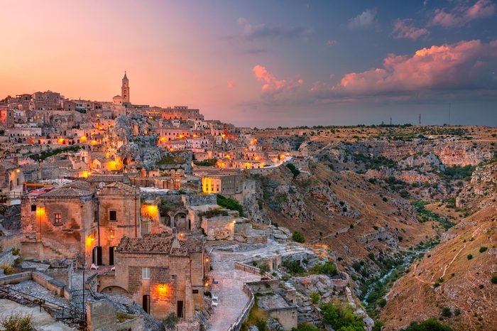 Matera, Italy. Cityscape aerial image of medieval city of Matera, Italy during beautiful sunset.