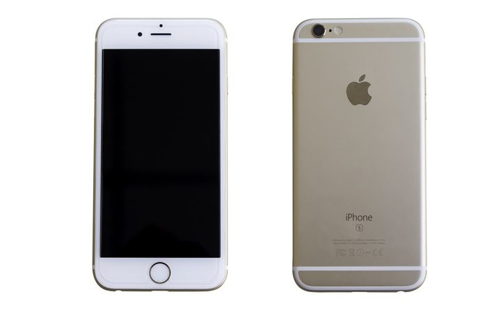 Bangkok, Thailand - January 1, 2017: Golden iPhone 7 on white background. The iPhone 7 is smart phone with multi touch screen produced by Apple Computer, Inc.