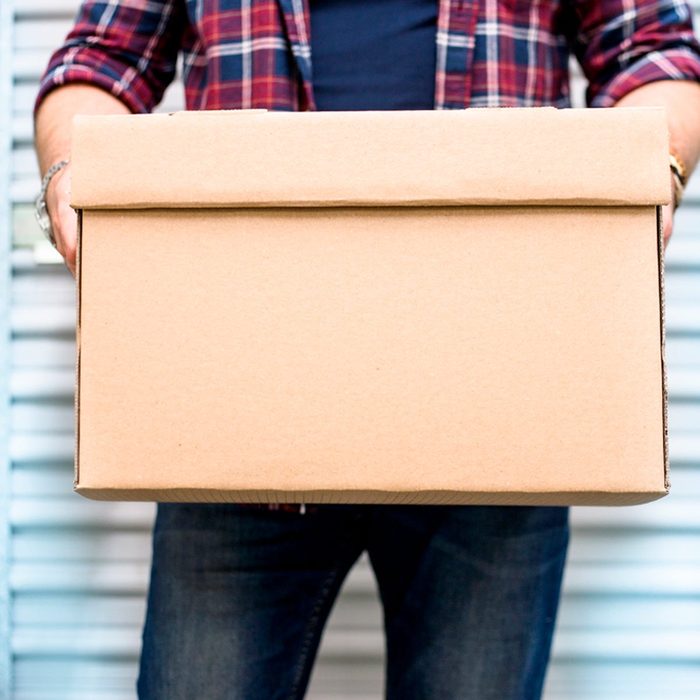 Man carrying a cardboard box