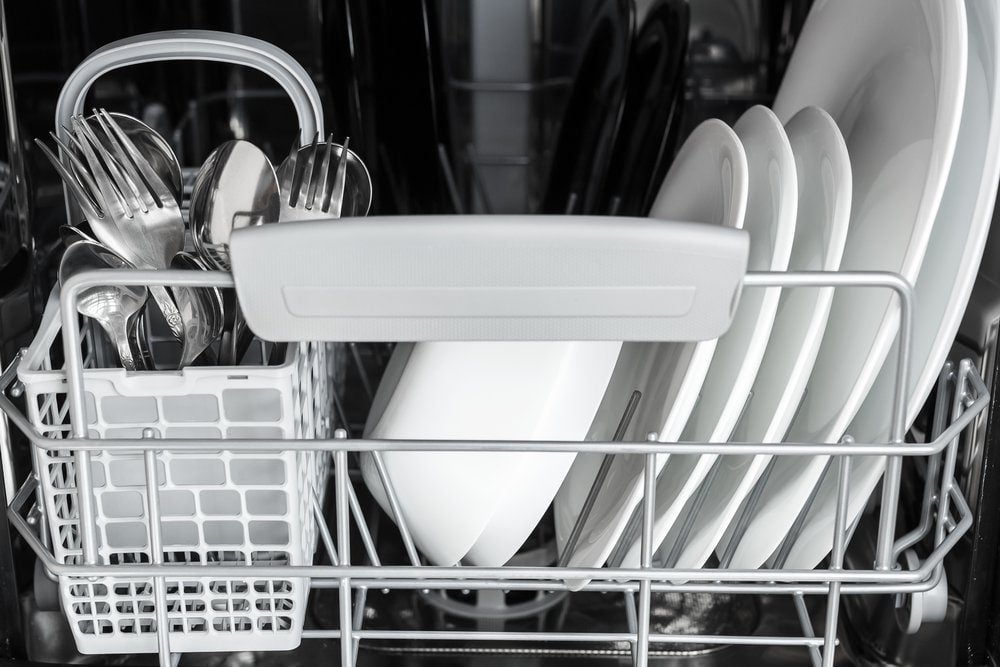 clean dishes inside the dishwasher after washing