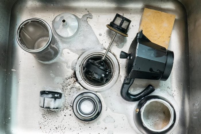 sink dirty dishes coffee maker