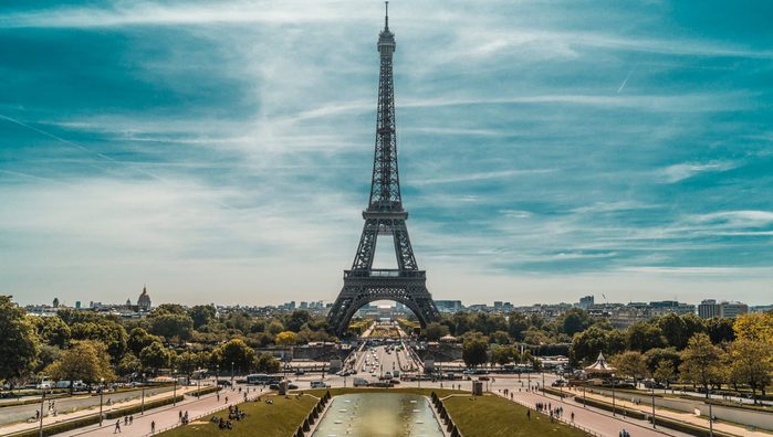 The Eiffel Tower is a wrought iron lattice tower on the Champ de Mars in Paris, France. It is named after the engineer Gustave Eiffel, whose company designed and built the tower.