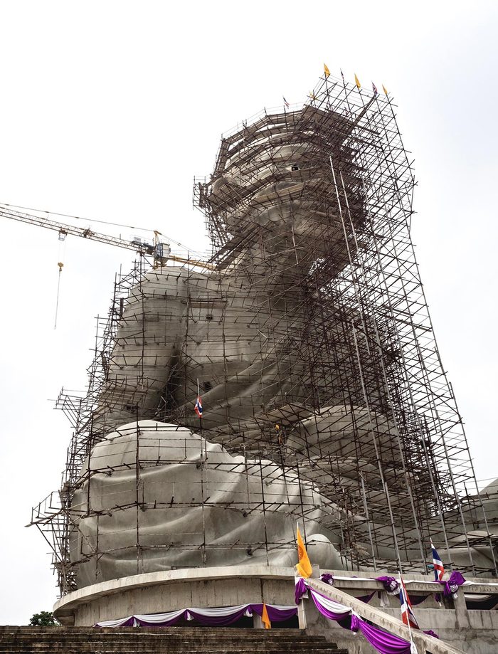 Luang Pu Thuat Statue Under Construction On White Sky Background