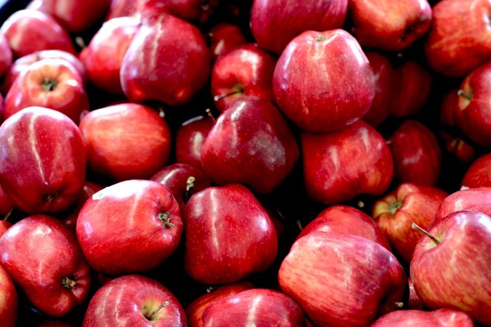 Red Washington apple at the farmer market, fresh and juicy