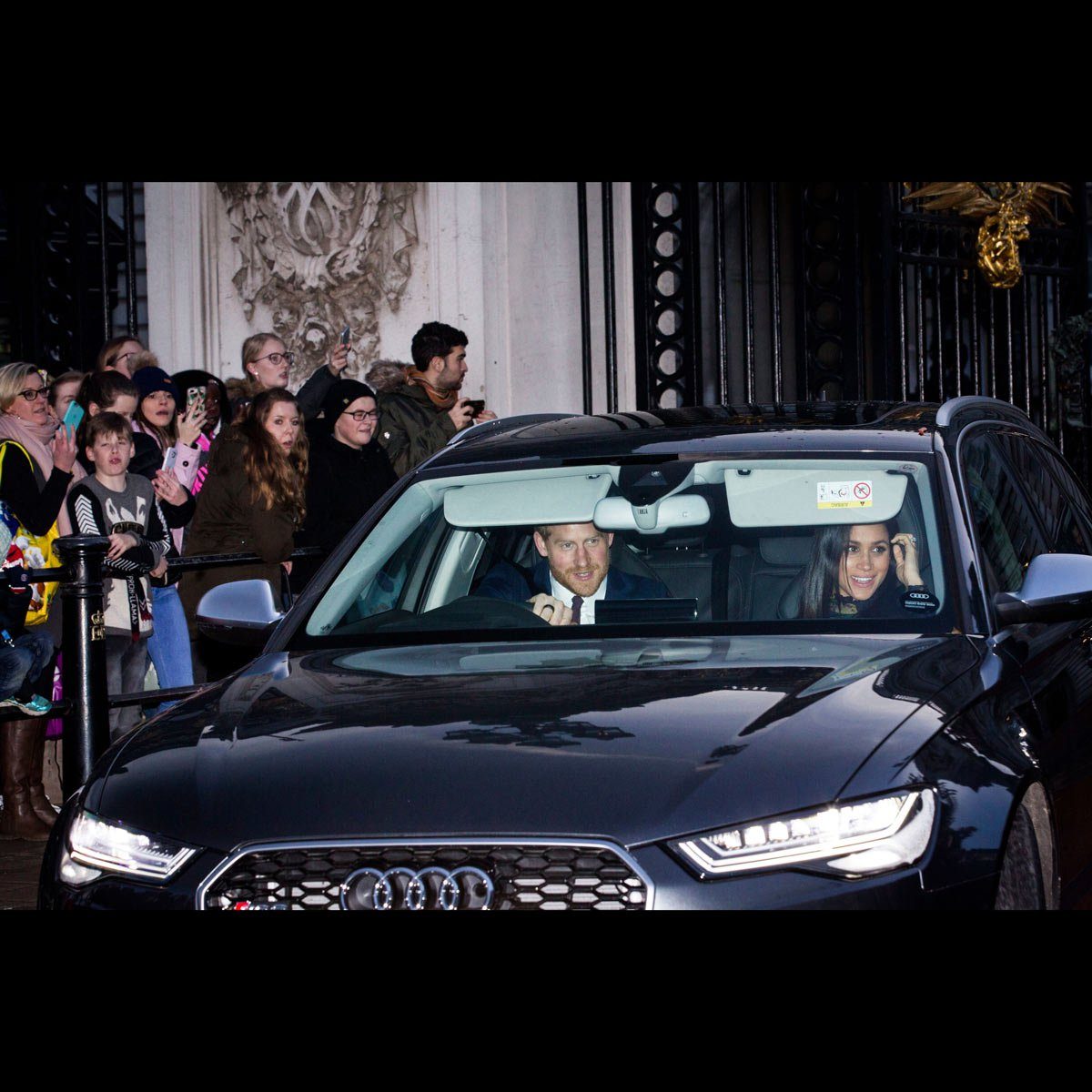 Prince Harry and Meghan Markle in an Audi