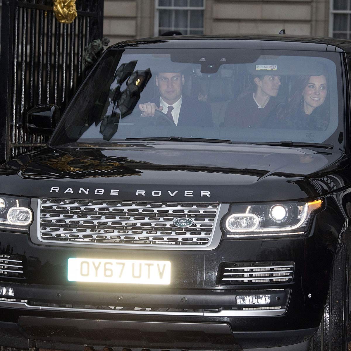 Prince William and Catherine Duchess of Cambridge drive in a black Range Rover