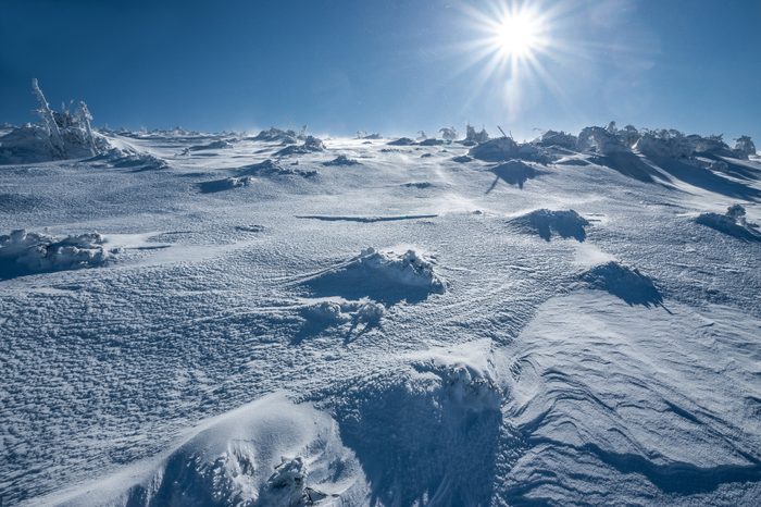 Antarctica ice desert landscape. Snowy hills on a frozen plain