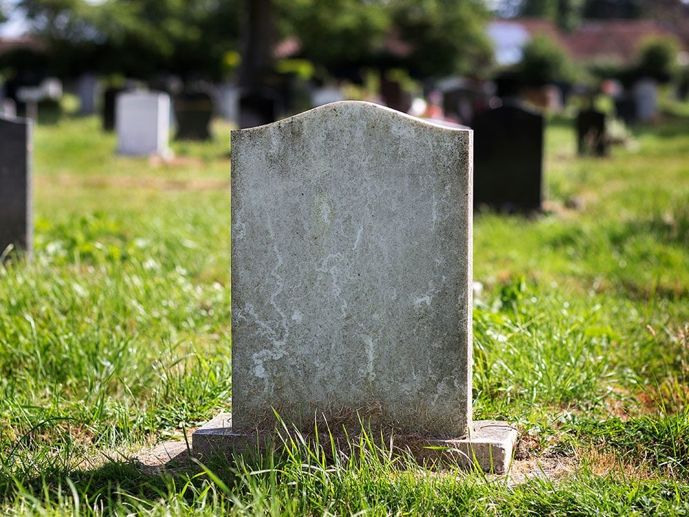 Outrageous news stories - faked death cemetery gravestone